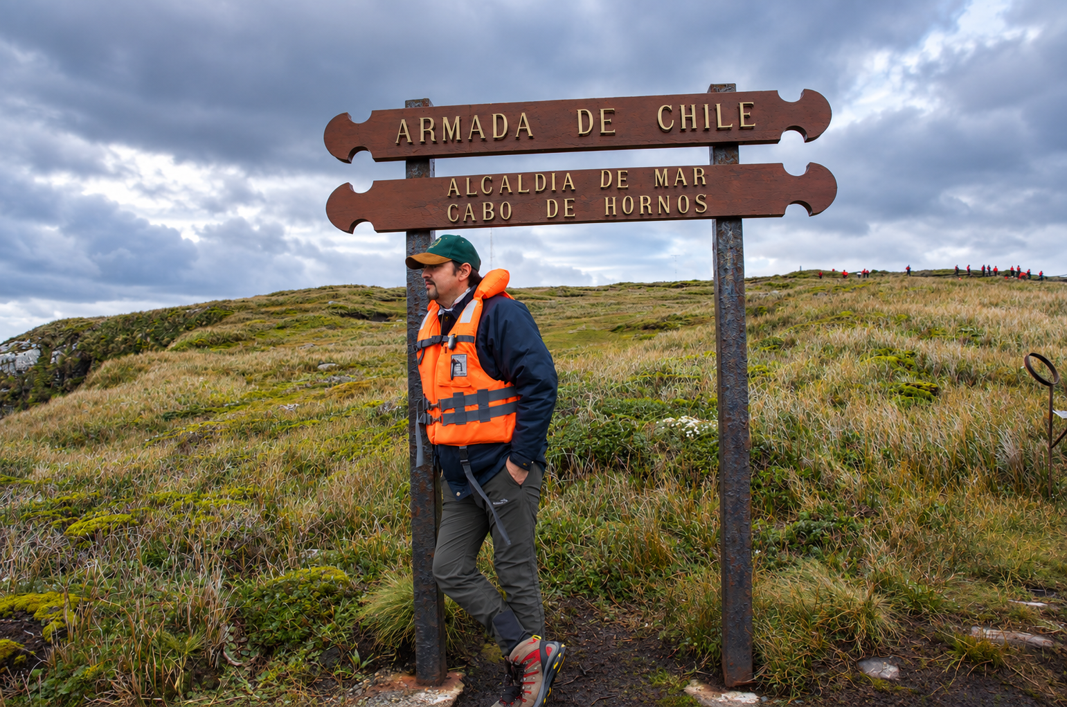 Jeff Gonzalez in a life jacket beneath the Cabo de Hornos sign in 2016